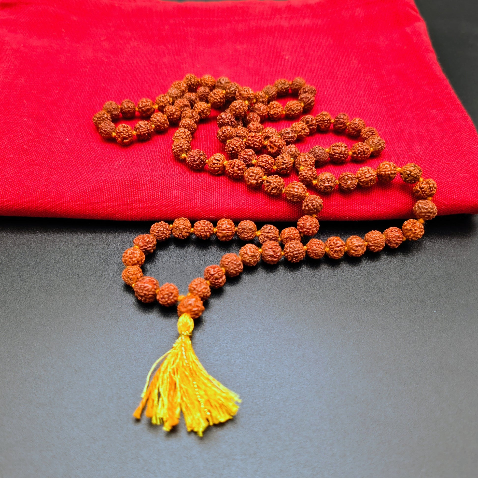 Rudraksh Mala with Yellow Tassle