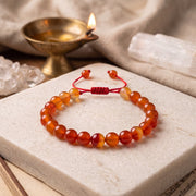 Red Carnelian Gemstone Rakhi Bracelet (Free Size)